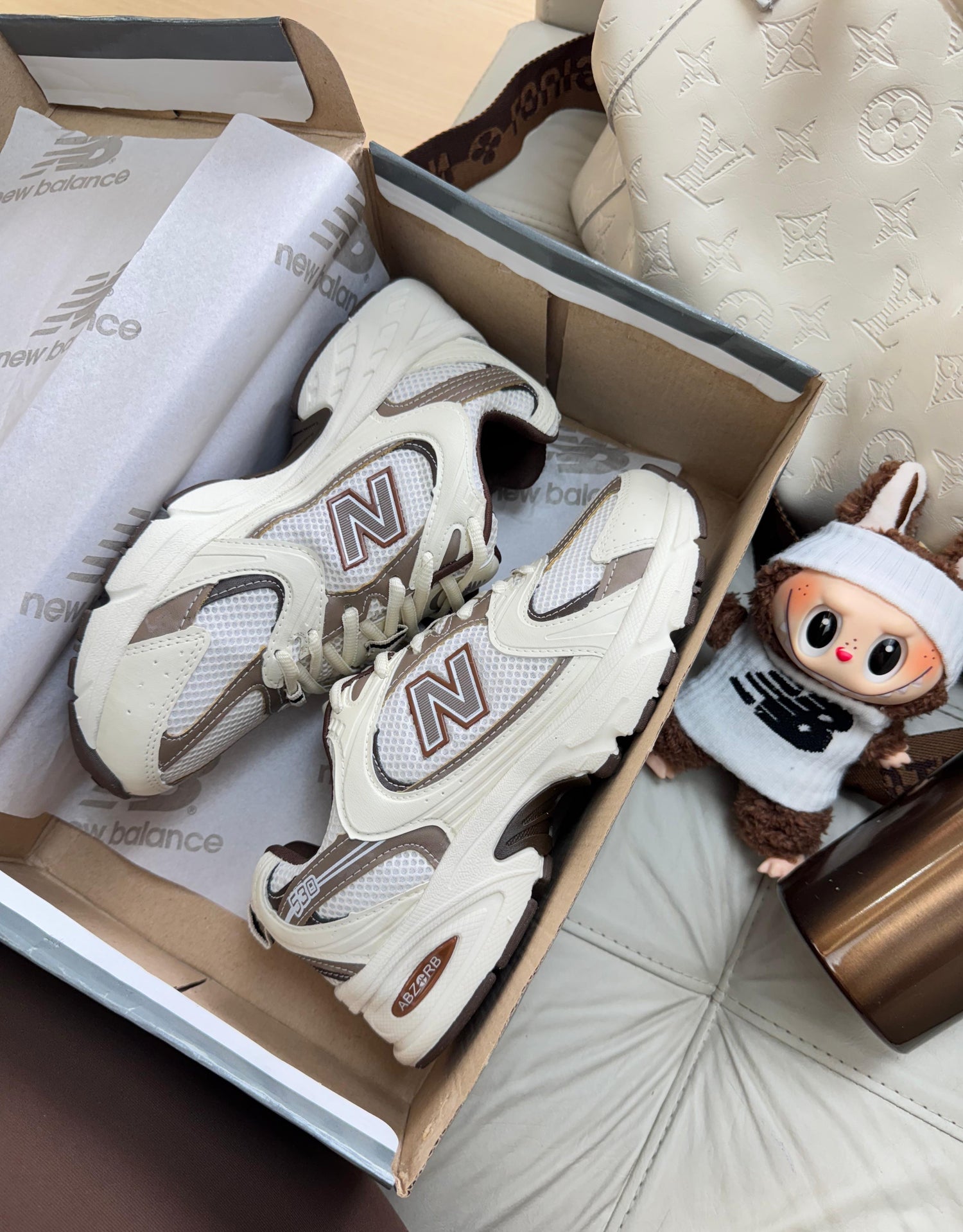 NB 530 Prime Couro Off/Café