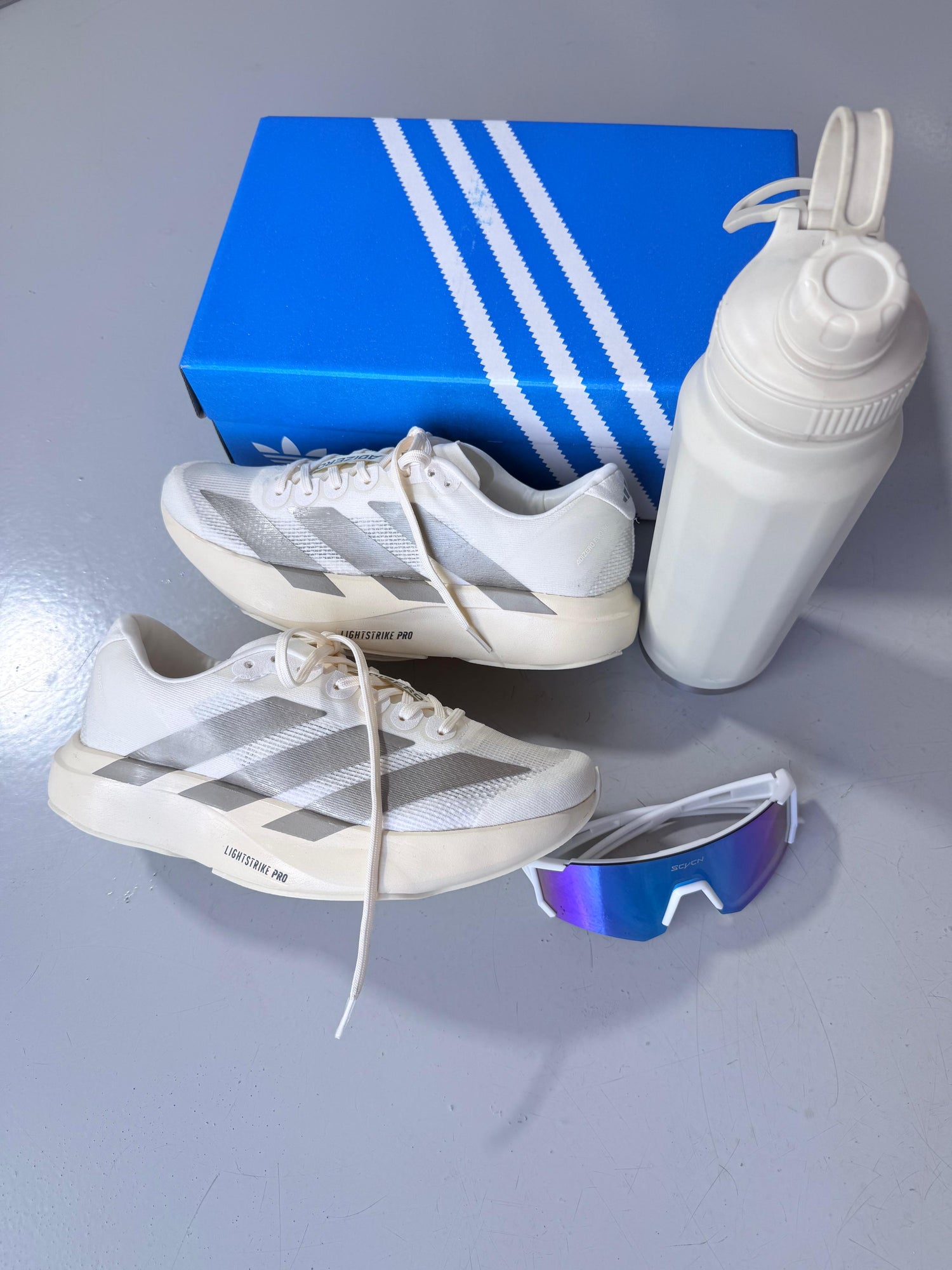 Adizero Evo SL Importado Off/Cinza